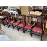 A SET OF SIX OAK BARLEYTWIST DINING CHAIRS ON BARLEYTWIST LEGS AND SUPPORTS, TWO BEING CARVER
