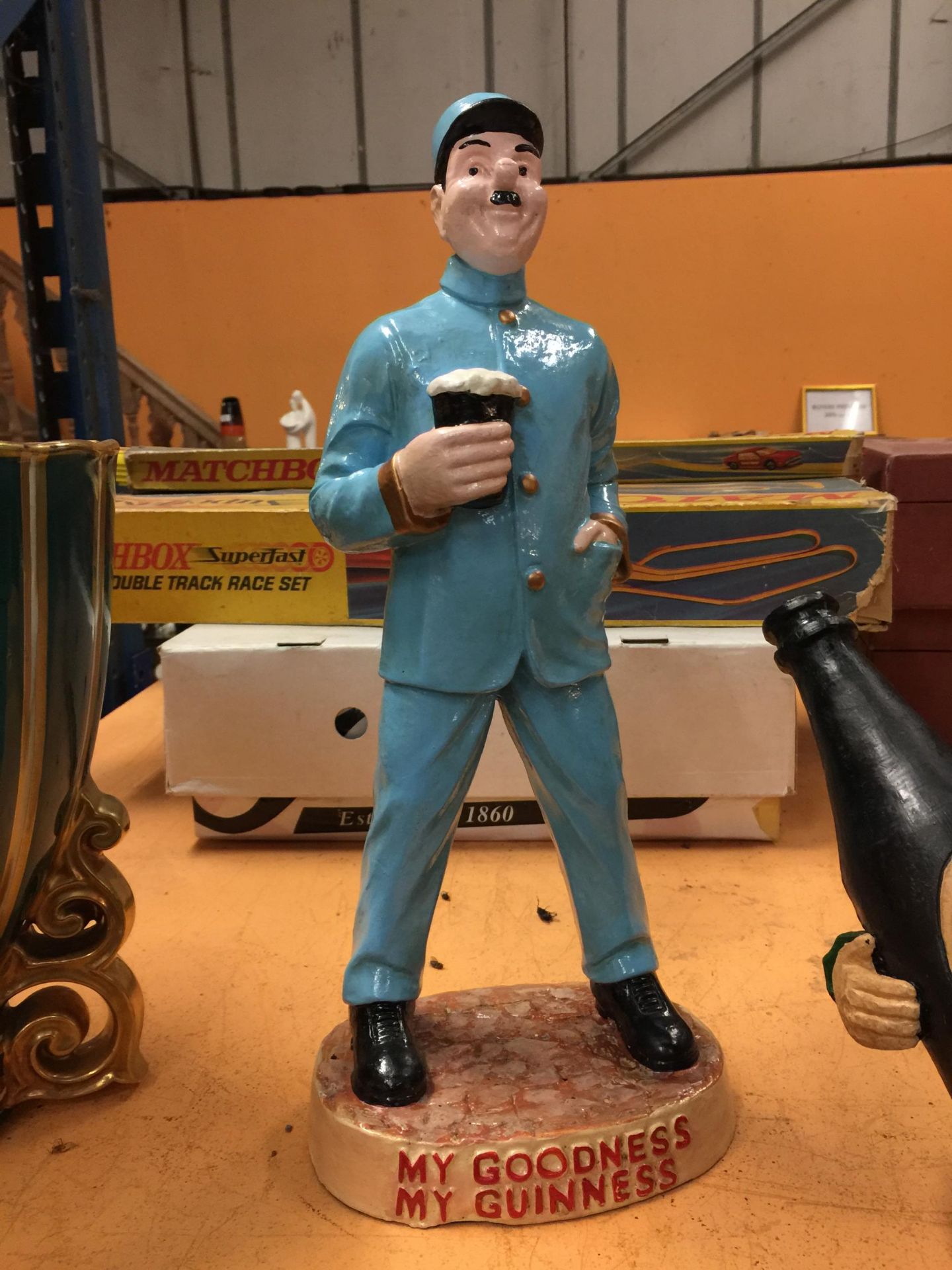 A LARGE 'MY GOODNESS MY GUINNESS' ZOO KEEPER FIGURE