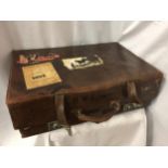A THE MARTIN WITH EVERLASTING SPRINGS LEATHER SUITCASE STAMPED H W FIDDAMAN WITH LABELS TO INCLUDE P