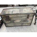 A VINTAGE WOODEN STORAGE TRUNK WITH CARRY HANDLES