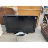 A 32" PANASONIC TELEVISION WITH REMOTE CONTROL