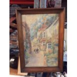 A FRAMED WATER COLOUR OF CLOVELLY