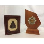 A WOODEN MOUNTED ROYAL SCOTS BADGE AND A FRAMED ROYAL ARMY ORDINANCE CORPS BADGE (2)