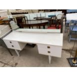 A 1970'S WHITE DRESSING TABLE, 60" WIDE