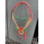 A LARGE ILLUMINATED WALL HANGING SANTA WITH PARACHUTE CHRISTMAS DECORATION (H:150CM) BELIEVED IN