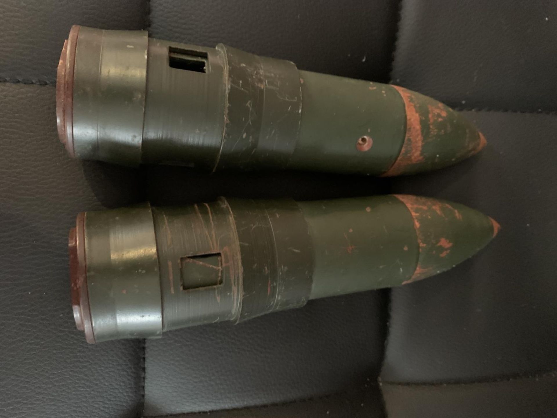 A PAIR OF CANNON SHELLS