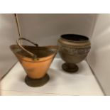 TWO ITEMS OF COPPER WARE, ONE BEING A SMALL SCUTTLE AND THE OTHER A PLANTER