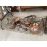 AN ASSORTMENT OF COPPER ITEMS TO INCLUDE THREE KETTLES AND A PAN ETC