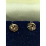 A PAIR OF 9 CARAT GOLD KNOT EARRINGS IN A PRESENTATION BOX