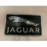 A GREEN CHROME JAGUAR SIGN, SIZE 29CM X 17CM