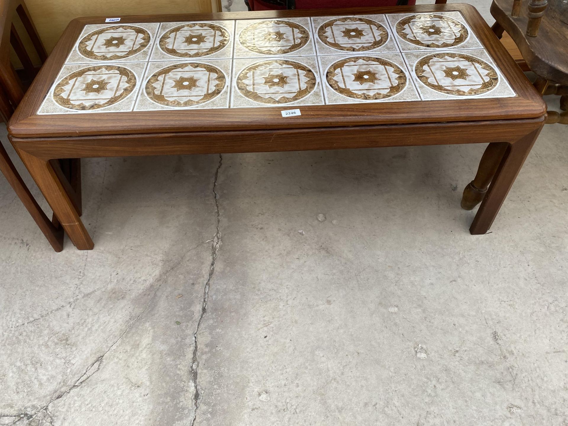 A RETRO TEAK COFFEE TABLE WITH INSET TILED TOP, 44 X 20"