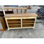 AN OAK OPEN BOOKSHELF WITH PAINTED FRAME