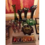 A NUMBER OF COLLOURED GLASS AND CARNIVAL STYLE GLASS PIECES TO INCLUDE SHOT GLASSES, VASES AND BOWLS