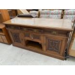 A VICTORIAN OAK SIDEBOARD WITH HEAVILY CARVED DOORS AND DRAWERS, 72" WIDE