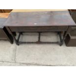 AN 18TH CENTURY OAK SIDE TABLE WITH TURNED LEGS AND STRETCHERS AND TWO END DRAWERS, 55" WIDE