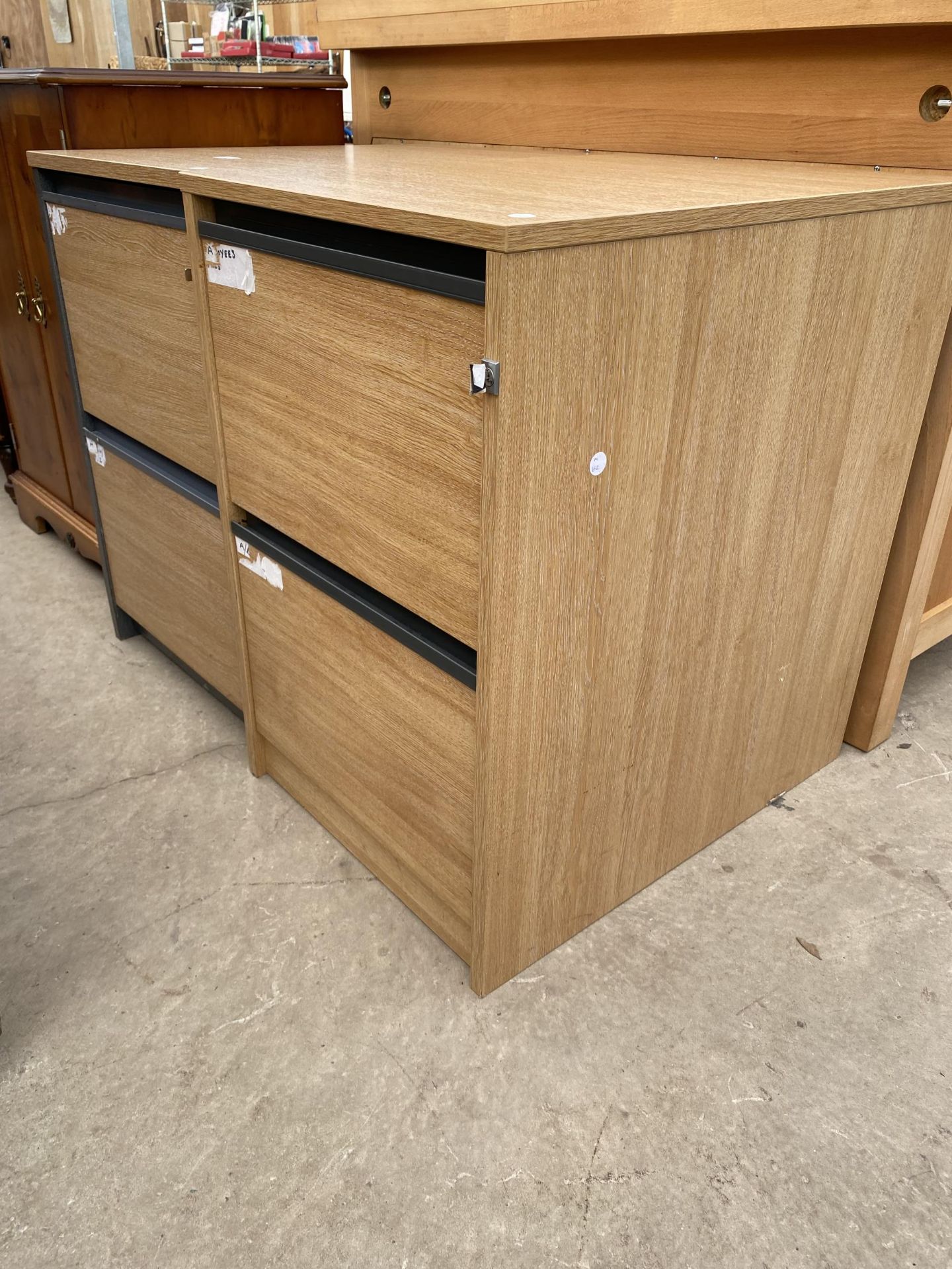 A PAIR OF LIMED OAK EFFECT TWO DRAWER FILING CABINETS COMPLETE WITH TWO KEYS - Image 2 of 3