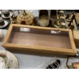 A COUNTER TOP DISPLAY CABINET SIZE; WIDTH 62CM, DEPTH 25CM, HEIGHT 8CM