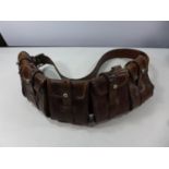 AN EARLY 20TH CENTURY LEATHER FIVE SECTION MILITARY CARTRIDGE BELT