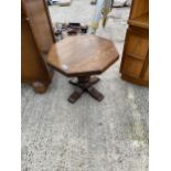 AN OAK OCTAGONAL OCCASIONAL TABLE