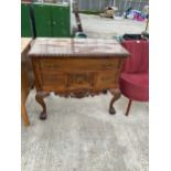 A HARDWOOD CHIPPENDALE STYLE SIDE CHEST WITH ROPE EDGE ENCLOSING FOUR DRAWERS, ON CABRIOLE LEGS, 35"