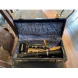 A CASED PART CLARINET WITH BOX OF REEDS