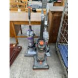 THREE VACUUM CLEANERS TO INCLUDE TWO VAX AND A DYSON