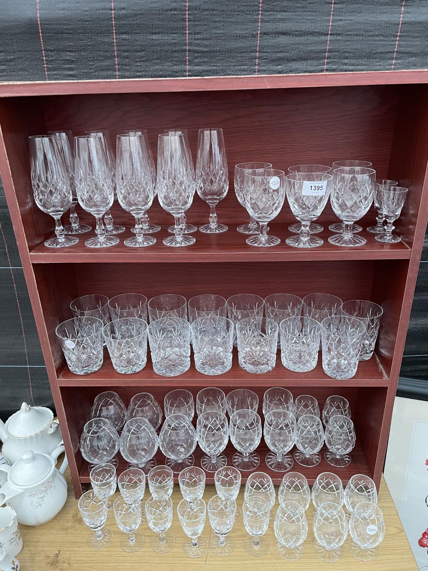 AN ASSORTMENT OF CUT GLASS WARE TO INCLUDE BRANDY BALLOONS, TUMBLERS AND SHERRY GLASSES ETC