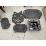 AN ASSORTMENT OF DECORATIVE TRIVET STANDS