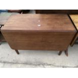 A VICTORIAN MAHOGANY DROP-LEAF TABLE