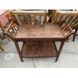 A 20TH CENTURY TEAK ASIAN STYLE TWO TIER TROLLEY WITH TWO END DRAWERS