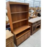 A RETRO TEAK NATHAN STYLE LOUNGE UNIT, 40" WIDE