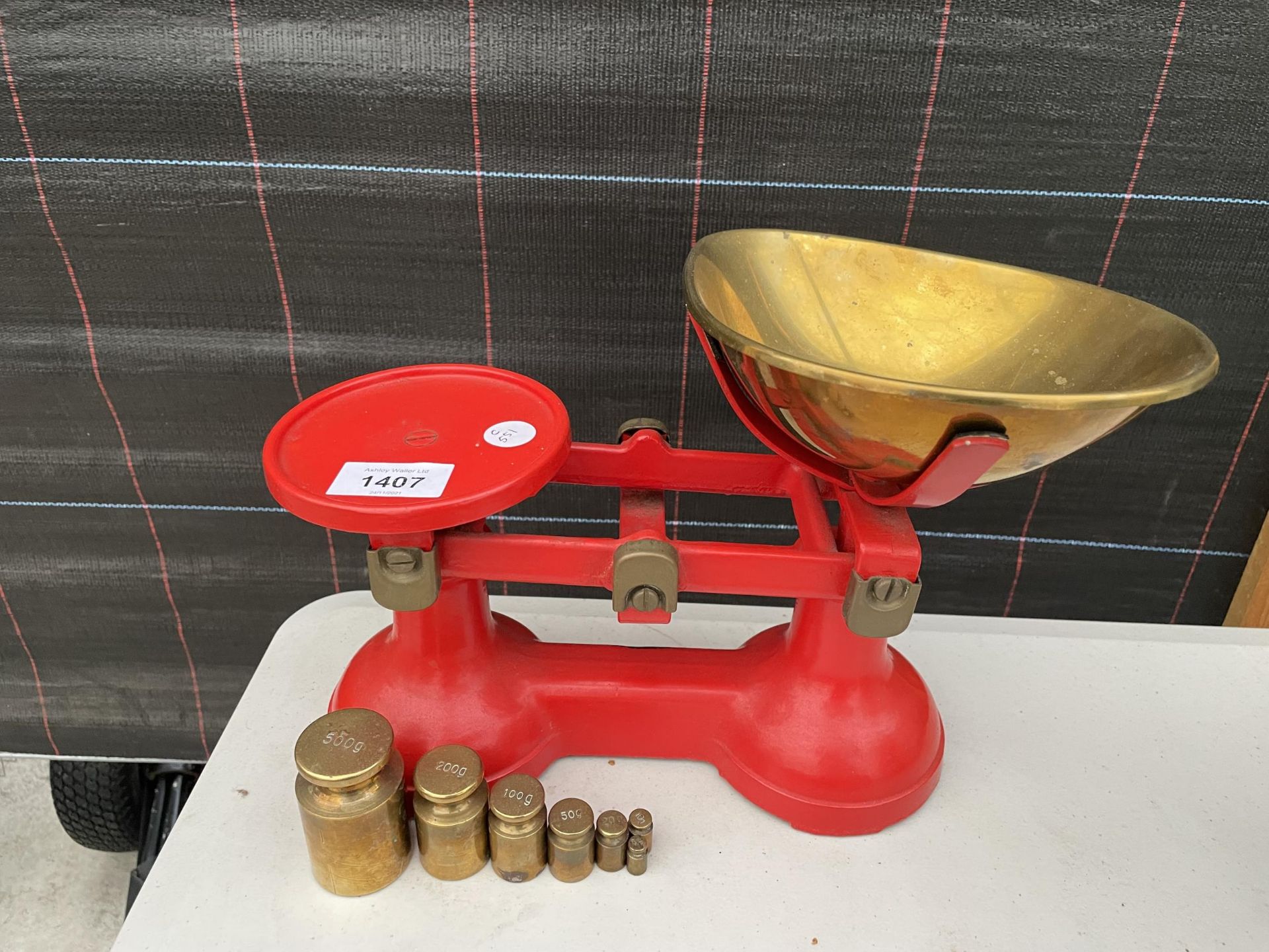 A SET OF VINTAGE SCALES WITH VARIOUS BRASS WEIGHTS