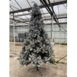 AN ARTIFICAL SNOW CHRISTMAS TREE ALL COMPLETE WITH STAND APPROXIMATELY 9FT TALL