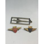 A CONCORDE PENDANT AND TWO BADGES TO INCLUDE BRITISH AIRWAYS JJC AND JUNIOR JET CLUB