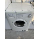 A WHITE BENDIX WASHING MACHINE