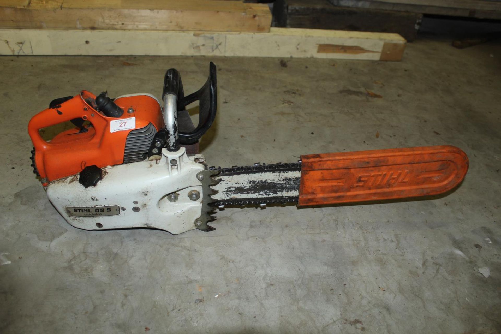 A STIHL O8S PETROL CHAINSAW