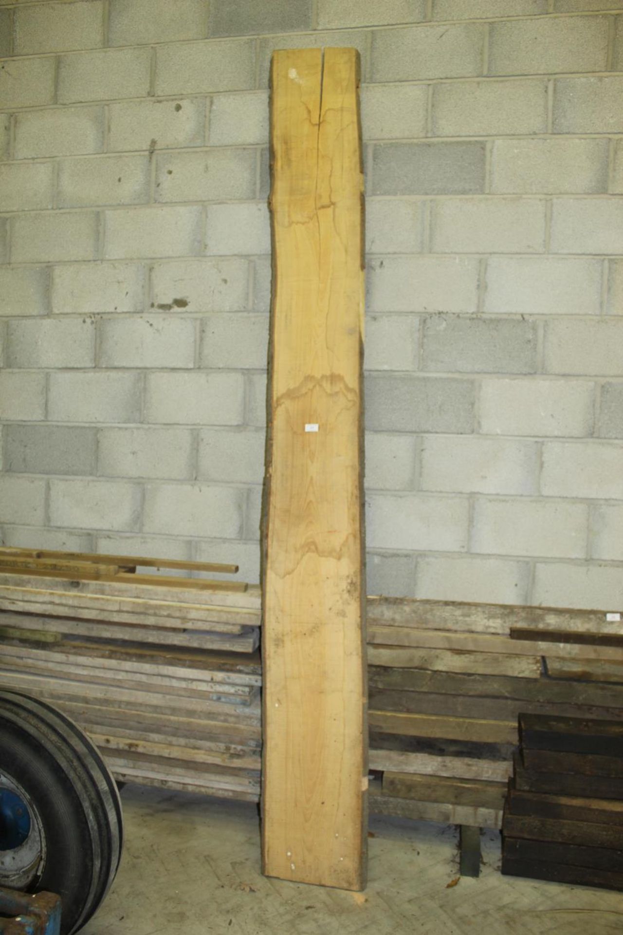 A LARGE PLANK 10FT LONG