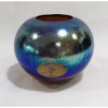 A Siddy Langley studio glass vase with iridescent blue and ochre "moonrise" detail. Height 13cm