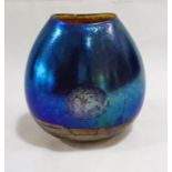 A Siddy Langley studio glass vase with iridescent blue and ochre "moonrise" detail. Height 17cm