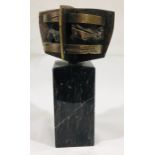 A modernist bronze sculpture on a marble base foundry mark for Morris Singer London. Monogram to