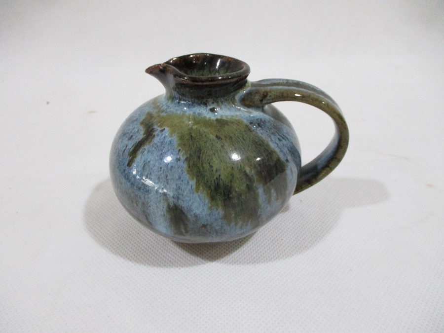 A collection of studio pottery including a teapot, small jug, and usual bust shape vase A/F - Image 8 of 29