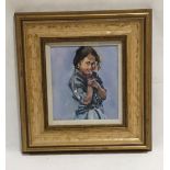 A framed oil on board entitled "Indian Boy - Rajasthan" by artist Jo Dixon. Overall size 34cm x