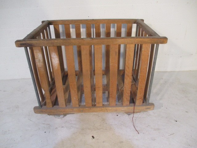 A slatted wooden bobbin trolley - length 108cm, width 70cm