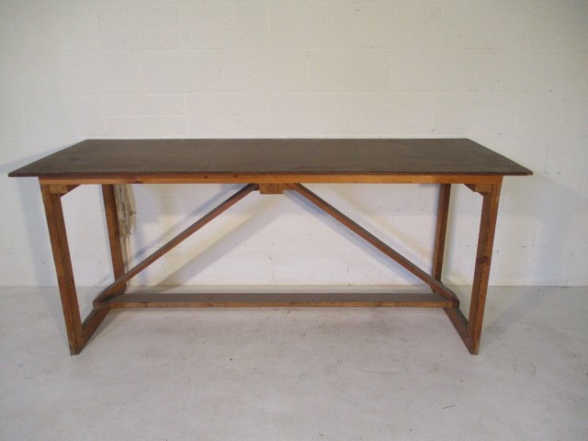 A handmade trestle style table, 205 cm x 72 cm x 90 cm