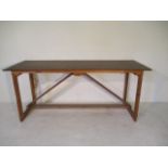 A handmade trestle style table, 205 cm x 72 cm x 90 cm