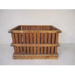 A large wooden slatted crate, 145cm x 106 cm