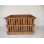 A large slatted crate, 146 cm x 106 cm x 94 cm