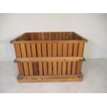 A large slatted crate with drop down side, 143cm x 106cm x 94cm