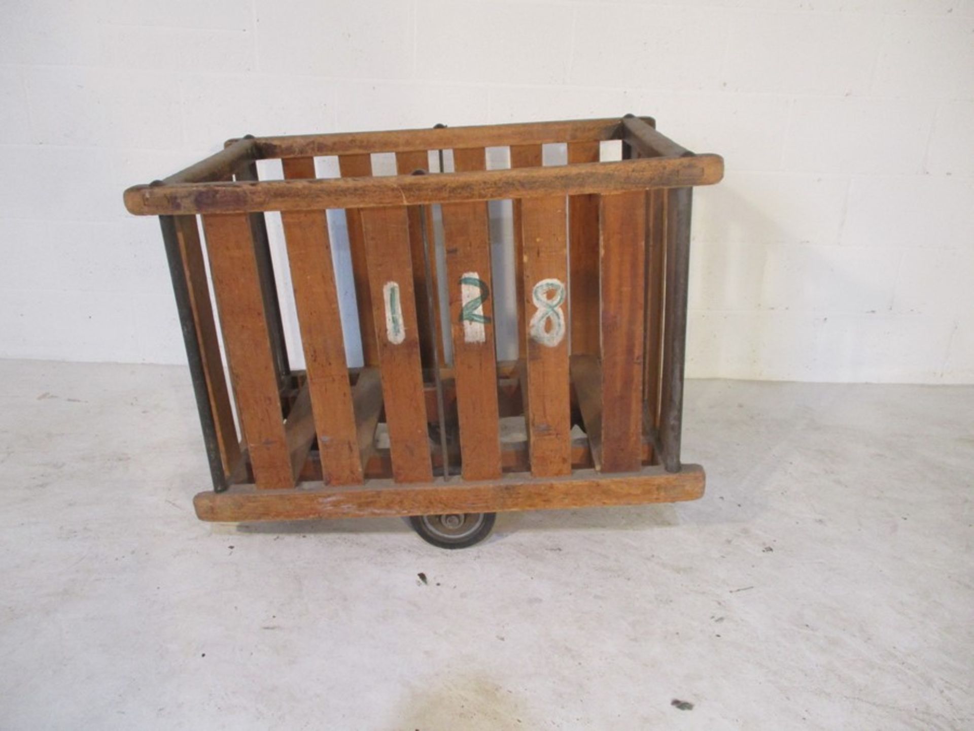 An industrial slatted wooden bobbin tilt trolley - length 107cm, width 66cm