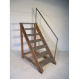 A set of industrial steps, rail loose, overall height 196 cm